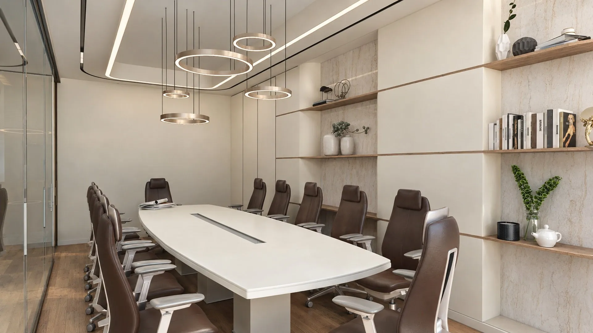 Board room with a long white table and ring pendants