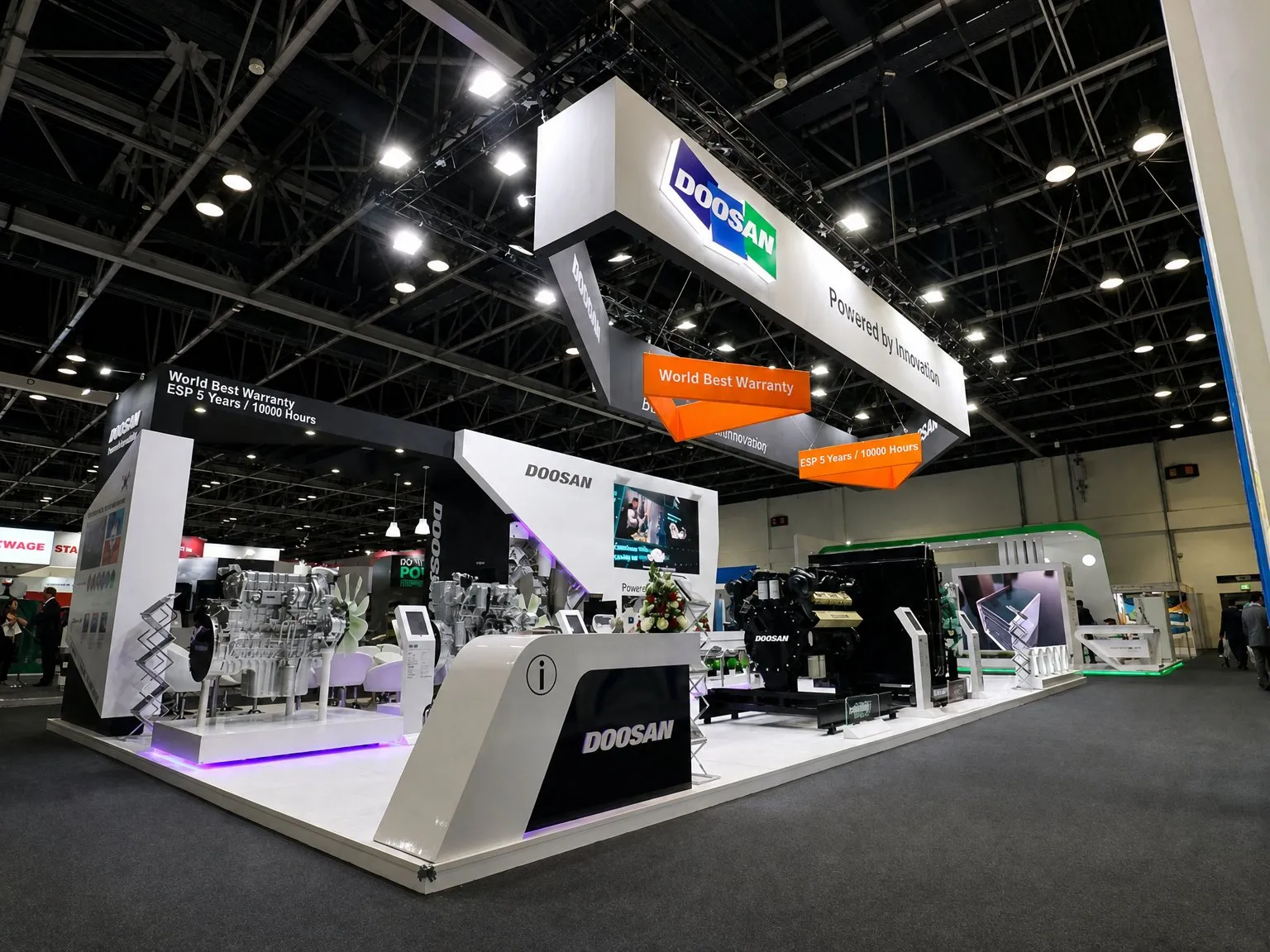 Doosan exhibition stand with engines on display and a large suspended sign