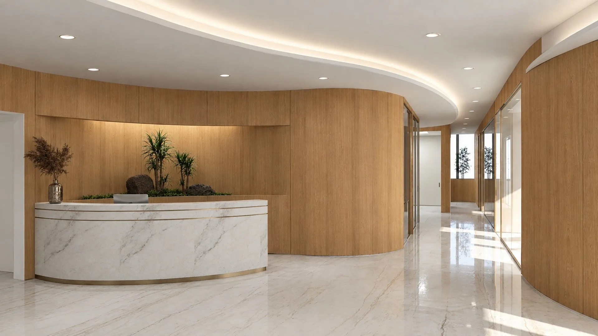Reception desk in white marble with a brass band, set against curved oak panelling
